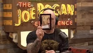 Joe holds a replica of the old testament